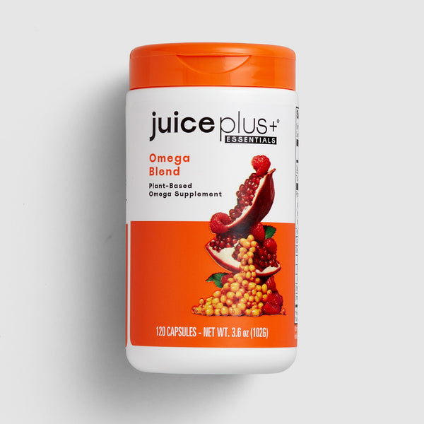 Juice Plus+ Omega Blend supplement container on a light gray background