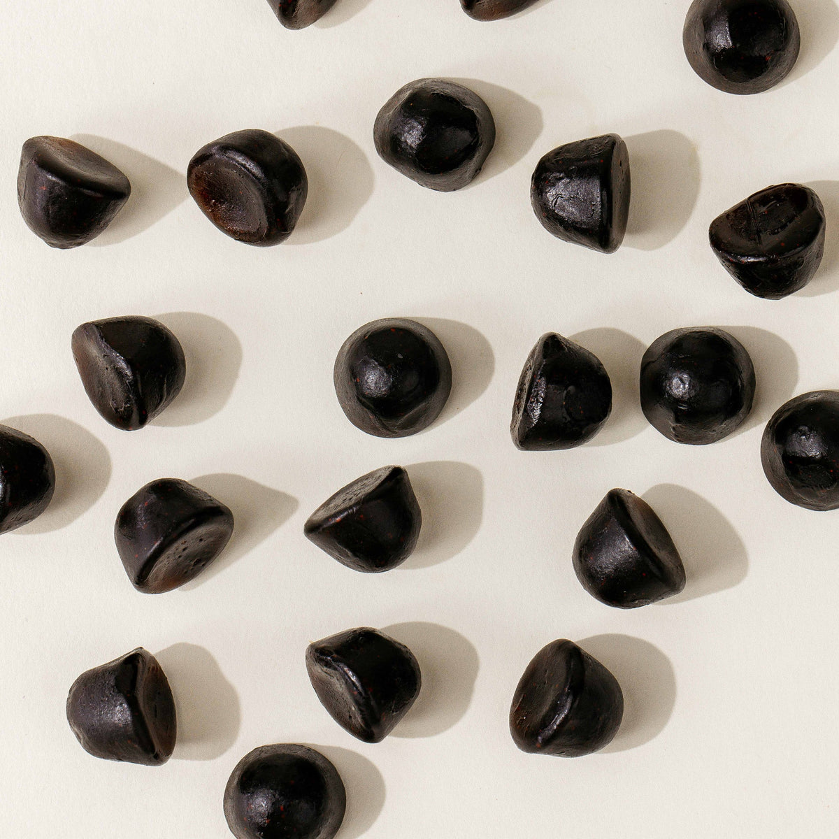 Pattern of Juice Plus+ Chewables on a light background