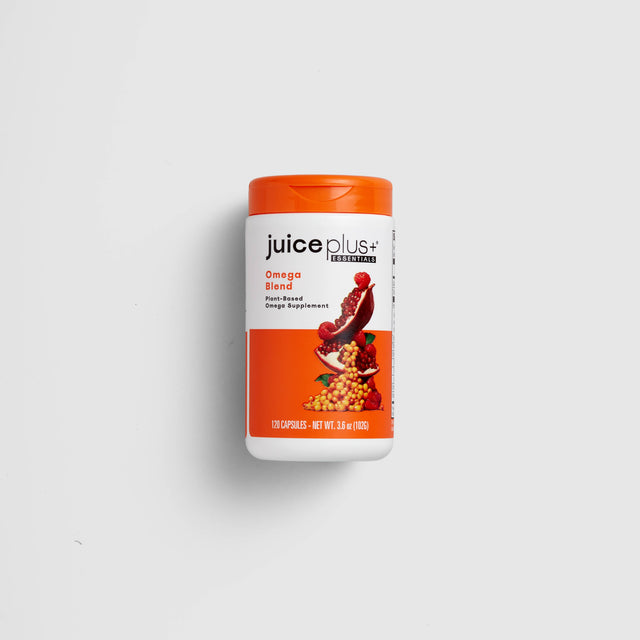 A container of Juice Plus+ Omega Blend capsules with a predominantly orange label.
